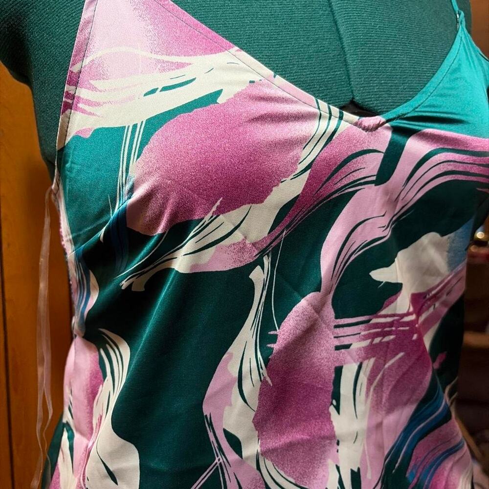 Stars above multicoloured floral graphic slip top